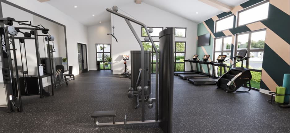 Modern gym with various fitness equipment including treadmills, weight machines, and exercise bikes, featuring large windows and geometric wall design.